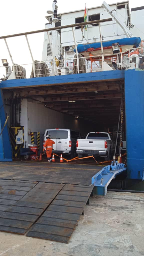 Vehicles parked inside MV Dudu Express, seen from the stern ramp
